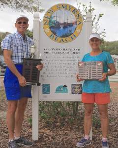 Randy and Bonnie Radke of the Coronado/Mainland Shuffleboard Club show their trophies and plaques they earned during the 2016 tournaments.